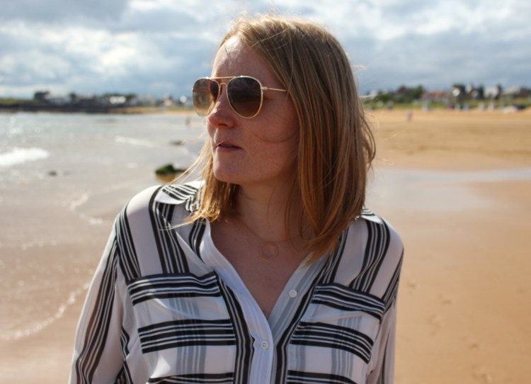 Striped-shirt-distressed-jeans-beach-outfit