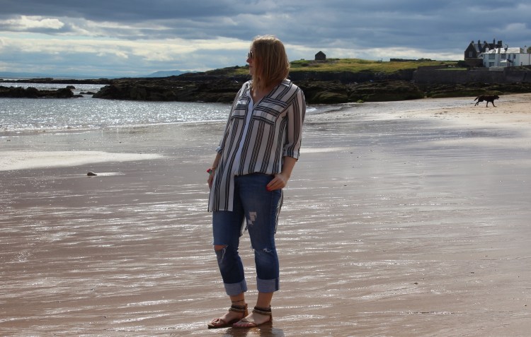 Striped-shirt-distressed-jeans-beach-outfit