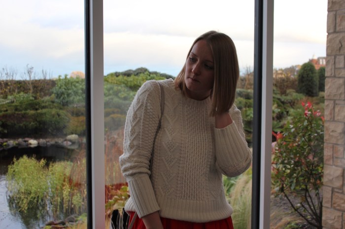 Red dress layered otk boots street style W=700 H=466 Red-dress-layered-otk-boots-street-style