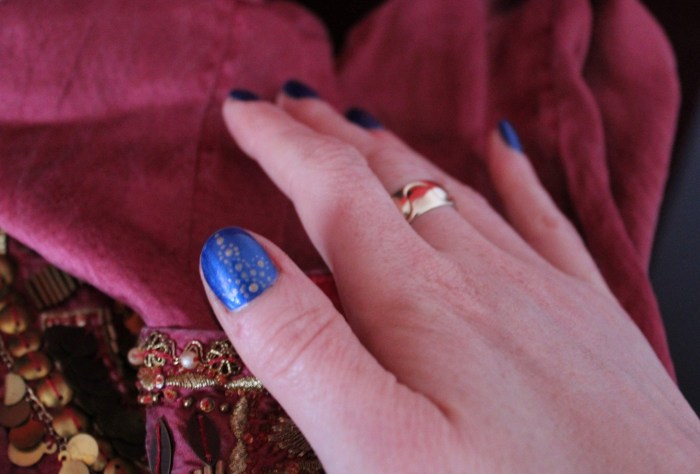 Egyptian-navy-gold-dotted-nail-art