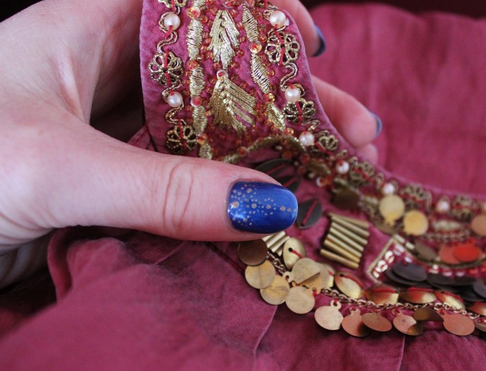 Egyptian-navy-gold-dotted-nail-art