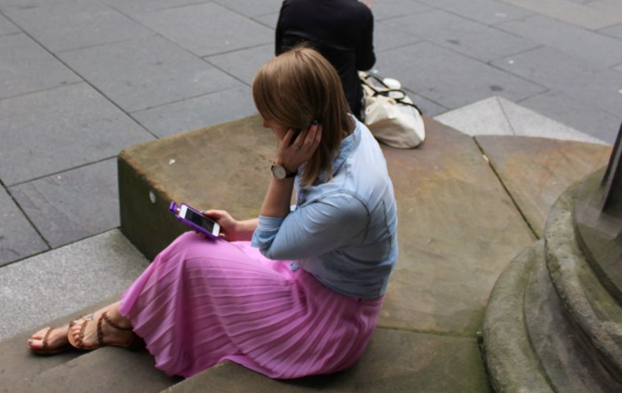 Pleated-midi-skirt-with-knotted-denim-shirt-street-style