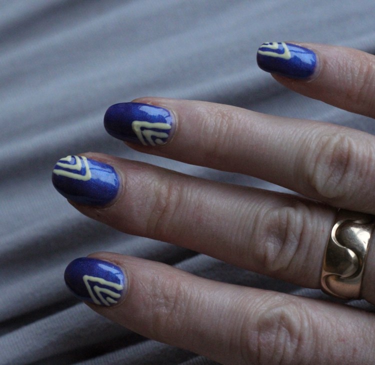 Like Neon Lights | Purple nail art with neon geometric design by UK Fashion Blogger Lauren Maria